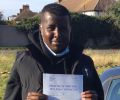 Mohamed with Driving test pass certificate